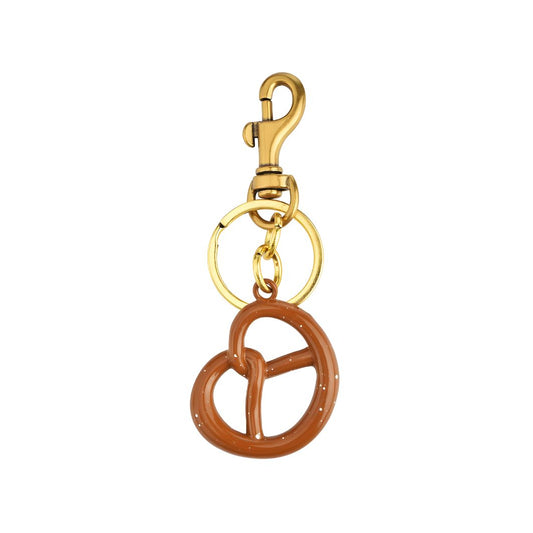 Dije de pretzel dorado | Lucía Montiel